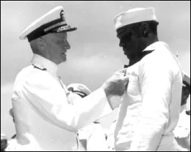 Admiral Chester Nimitz presenting the Navy Cross to Dorris Miller - Great Black Heroes